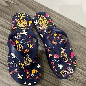 Tory Burch flip flops peace and love